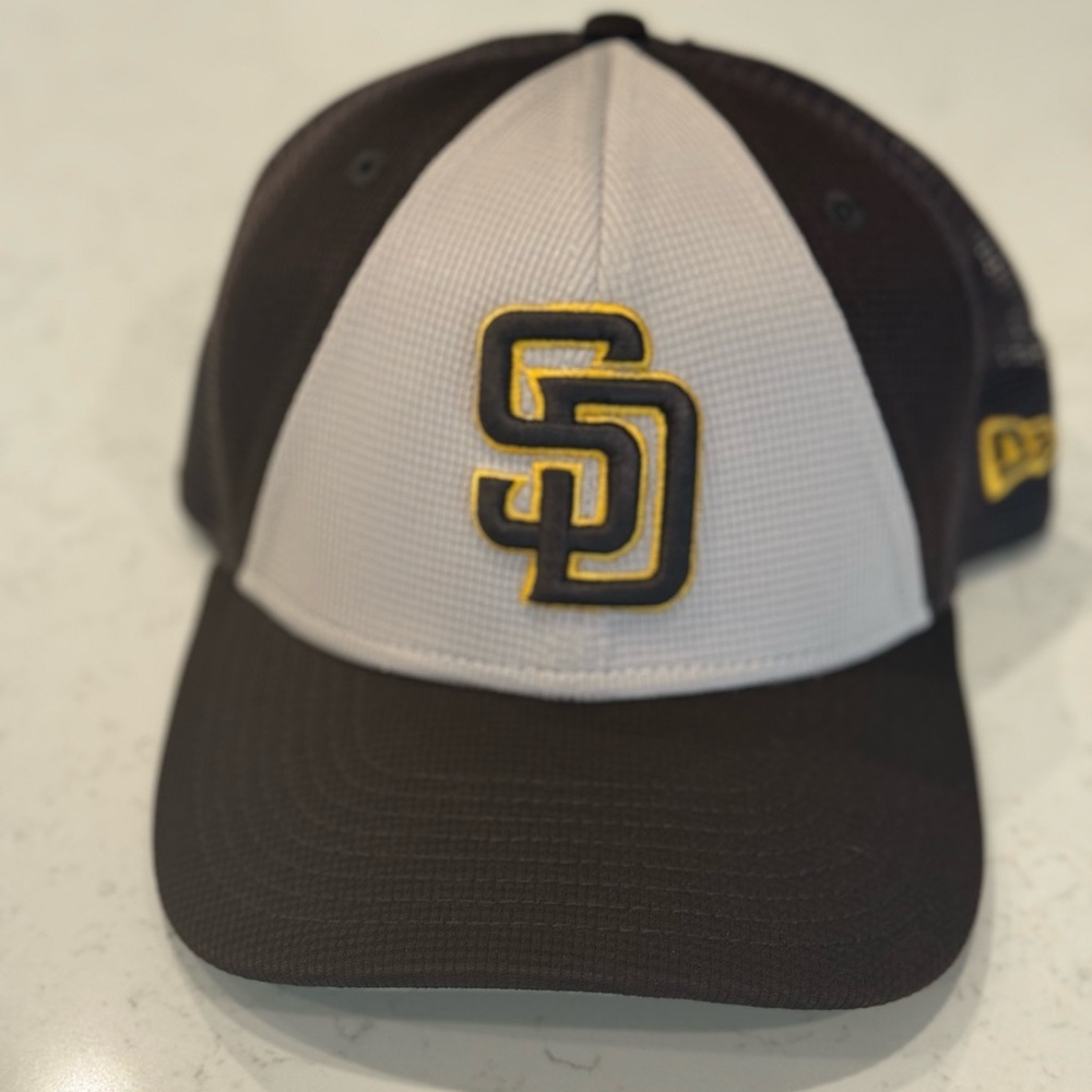 New Era Black and White Hat with Gold Logo